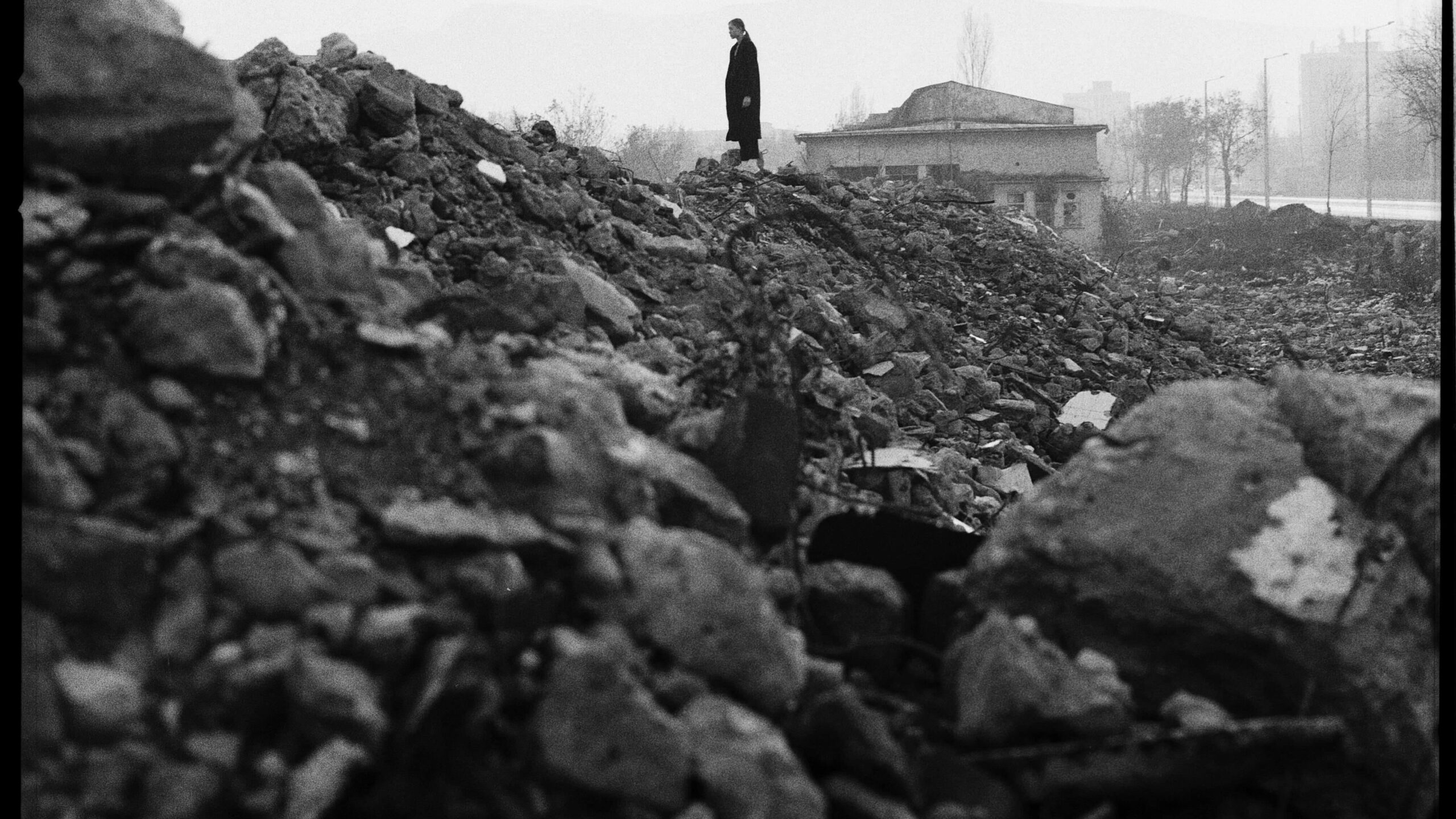 Person Standing On Rocks